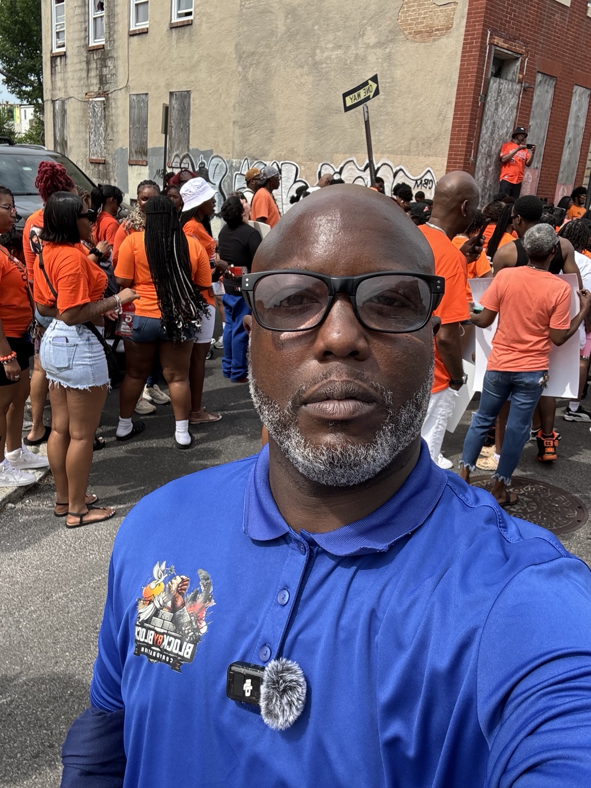 Damiasi Smith, Founder and Executive Director of BlockByBlock, at a Baltimore community event